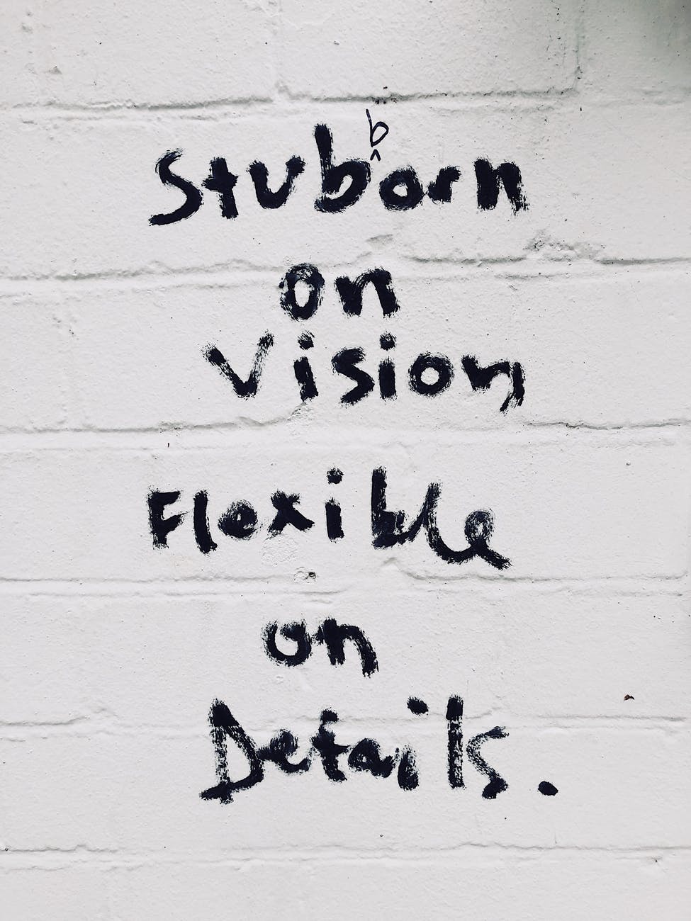 text on wall stubborn on vision flexible on details