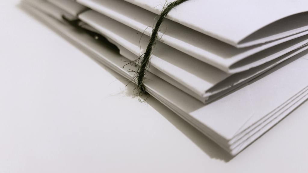 Folded documents on white background. 